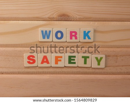 Word Work Safety on wood background