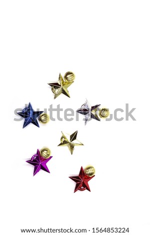 Christmas composition. Colorful stars decorations on white background. Christmas, winter, new year concept. copy space