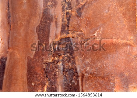 Red rough stone texture closeup horizontal background.