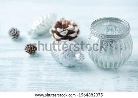 Christmas ornaments on bright wooden background. Close up. Copy space. 