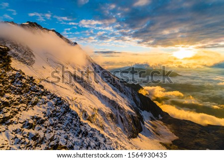 Stunning alpine sunset view near Aiguille de Bionnassay peak, Mont Blanc massif, France/Italy border, Alps, Europe