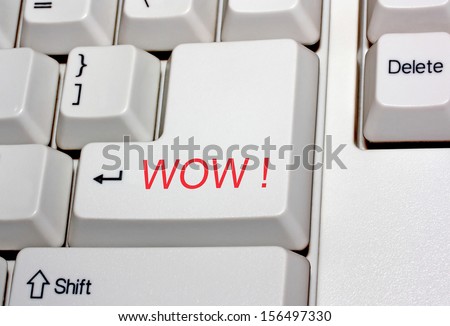 The keyboard. A key "wow". Business background.