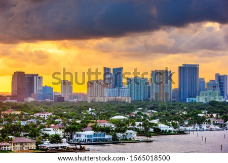 Fort Lauderdale, Florida, USA skyline and river at dusk.