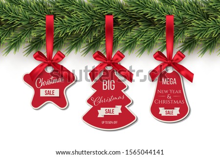 Christmas toys holding on fir tree with Sale text realistic illustrations set. Winter holidays decorations. New year blank tags, labels with ribbons pack. Various shapes pendants collection on white