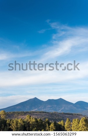 Landscape photo of Mt. Humphreys in Flagstaff Arizona.  Royalty-Free Stock Photo #1565063299