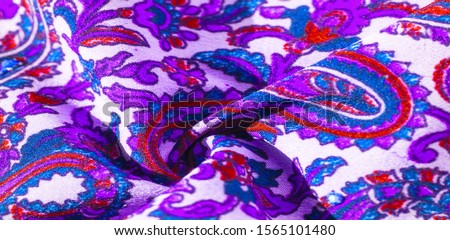 Background texture, pattern, paisley fabric cotton.  Designed by Kaffe Fassett for Free Spirit, the color palette of this large paisley is shades of green with hot pink, cobalt blue, fuchsia and purpl