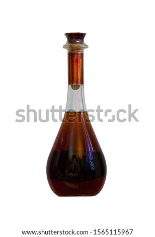 Brandy cognac whiskey whisky bottle unmarked unlabeled isolated on white background.