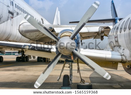rust airplane at the airport Royalty-Free Stock Photo #1565159368