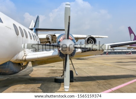 rust airplane at the airport Royalty-Free Stock Photo #1565159374