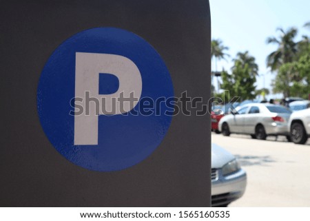 parking sign at the payment terminal. meters. authorized parking machine. Self service Machine parking pay on a city street.