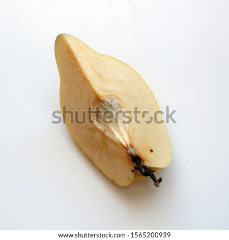 Big organic quince and quince sliced with worm on a white background