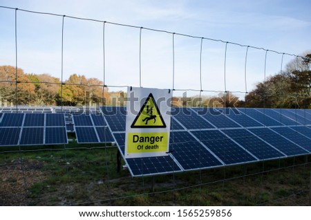 Large fenced off Solar Panel farm in fields in England