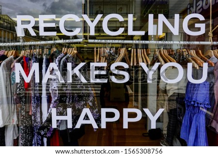 Turku, Finland Sept 12, 2019 The window of a second hand clothing store reading: "Recycling makes you happy."