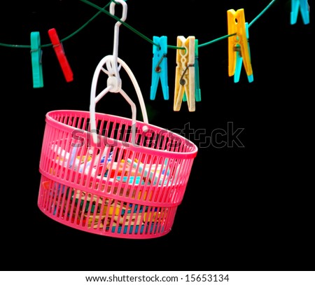 Clothesline with pegs and basket