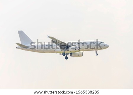 Airplane flying in the sky, landing preparation airport