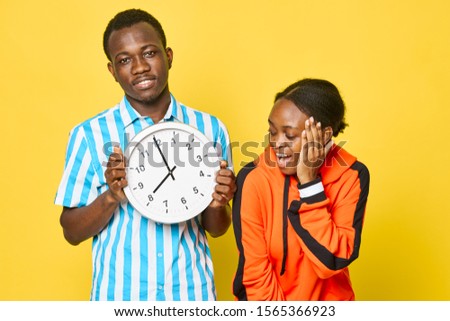 time watch in hands dark skin man and woman african appearance