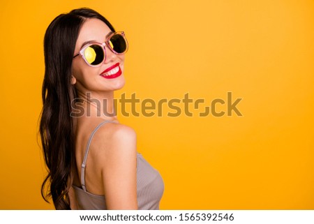 Photo of white cute pretty turned girlfriend looking at you smiling toothily with lips pomaded near empty space isolated vivid color background