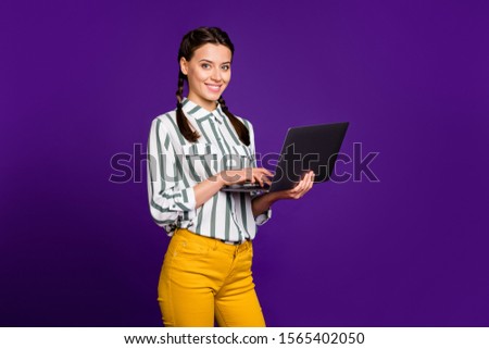 Photo of amazing business lady freelancer holding notebook hands writing working email partners wear striped shirt yellow trousers isolated purple color background