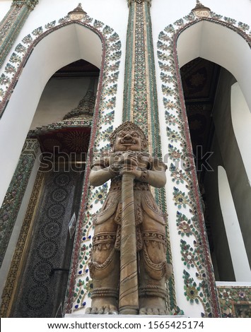Giant or Yak sculpture at the Temple of the Emerald Buddha (Wat Phra Kaew or Wat Phra Si Rattana Satsadaram) in Bangkok, Thailand, Southeast Asia. The picture was taken in January 2018.