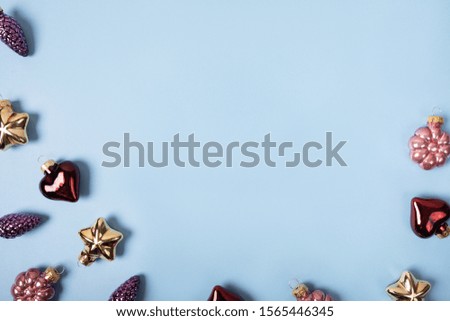 Christmas decoration on blue background, beautiful festive frame