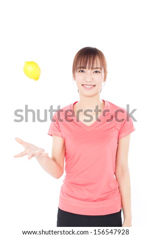 young woman with lemon isolated on white background 