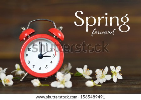 Spring forward. Daylight Saving Time. Summer time change  Royalty-Free Stock Photo #1565489491