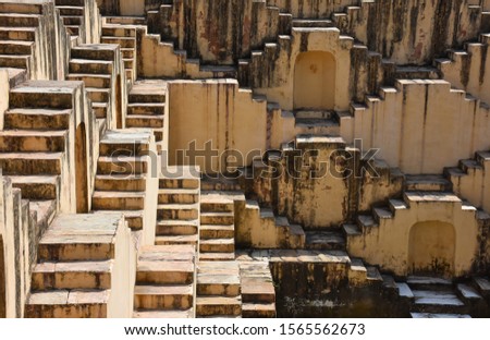 Step well Stairs, called baori located in pink city. Jaipur, India Royalty-Free Stock Photo #1565562673