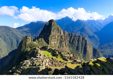 Machu Picchu,  a 15th-century Inca citadel, located in the Eastern Cordillera of southern Peru, on a 2,430-metre (7,970 ft) mountain ridge Royalty-Free Stock Photo #1565582428