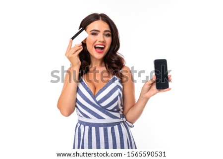 Beautiful caucasian woman choose a card between phone and card, picture isolated on white background