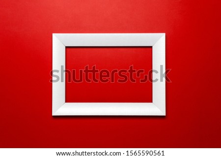 White frame simulated on a red background