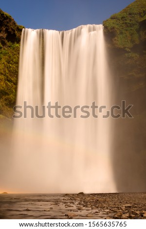 Long exposure photo of waterfall, view of the Skógafoss waterfall in the South of Iceland, Europe. 