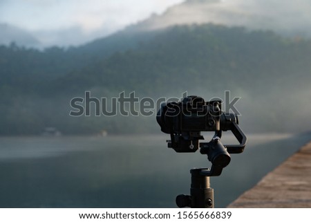 camera on the wall taking mountain picture