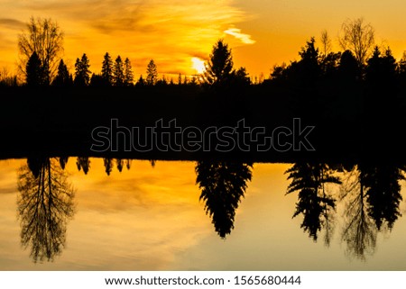 Beautiful sunset on river Kymijoki at autumn, Finland.