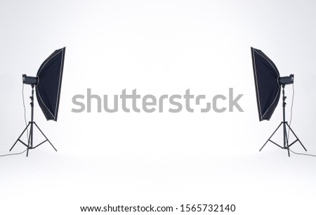 2 lightboxes, equipment in the photography studio Projecting the light onto a white background For shooting various objects or portraits.