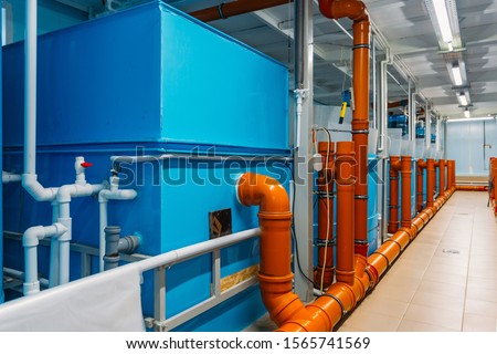 Water purification system in modern fish farm with closed water supply Royalty-Free Stock Photo #1565741569