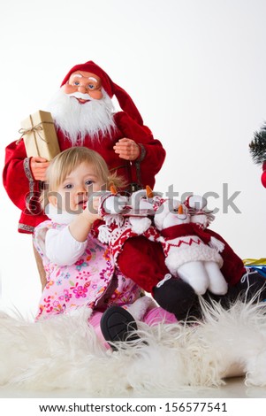 little baby girl with christmas decoration isolated on white