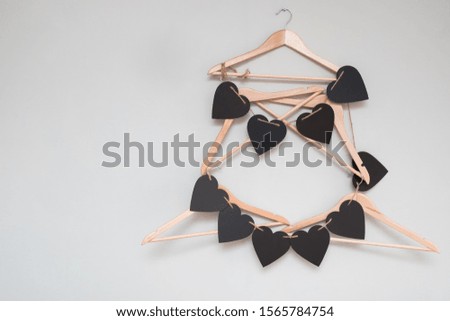 heart shaped tag garland on empty hangers