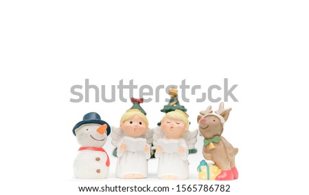 Christmas caroling or Carolers singing with snowman and reindeer on white background.Angel group singing carol song on celebration of christmas season in winter time.Chorus singing worship concept.