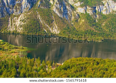 ird-eye view from the Vogel tramway cabin to the Bohinj Lake with beautiful mountains which reflected in turquoise water. Scenic nature landscape. Vogel ski center, Triglav National Park, Slovenia.