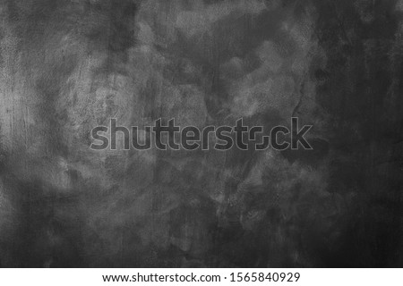 Black and white concrete vintage wall texture. Texture of a grey painted background.  Royalty-Free Stock Photo #1565840929