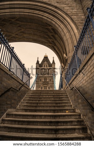 Looking up steps at Tower Bridge, London, UK