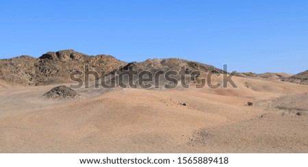 Dunes, mountains, sands and stones of the Namib desert in Namibia. Landscapes of South Africa