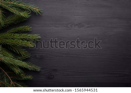 Christmas or New Year decoration background. Black grunge background with copy space.