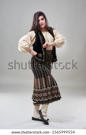 Young Romanian woman in traditional folklore costume