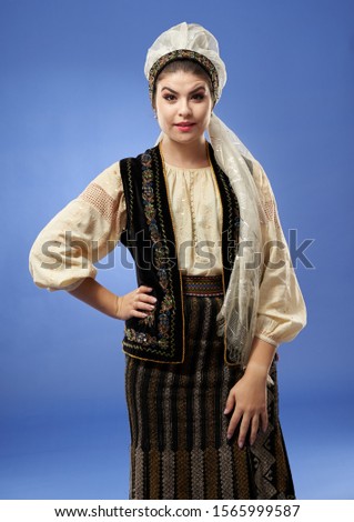 Young Romanian woman in traditional folklore costume