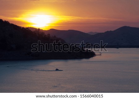 Central California lake sunset and mountains