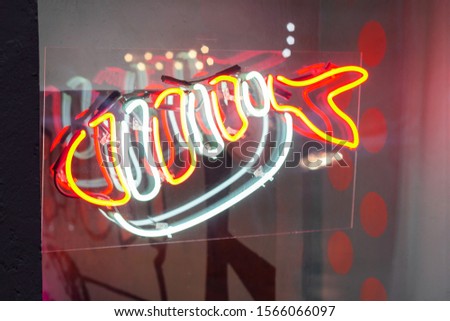 neon sign fish. health seafood. luminous commercial window