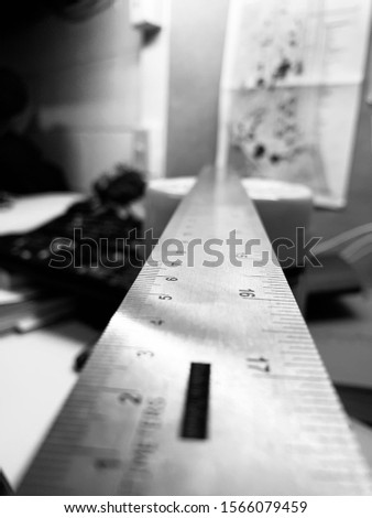 B&W photo of a ruler.