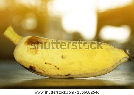 Yellow ripe bananas on the wood floor
