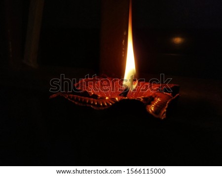 oil reflected wick burned flame danced wherever i drowned into your eyes those two diya enhanced  